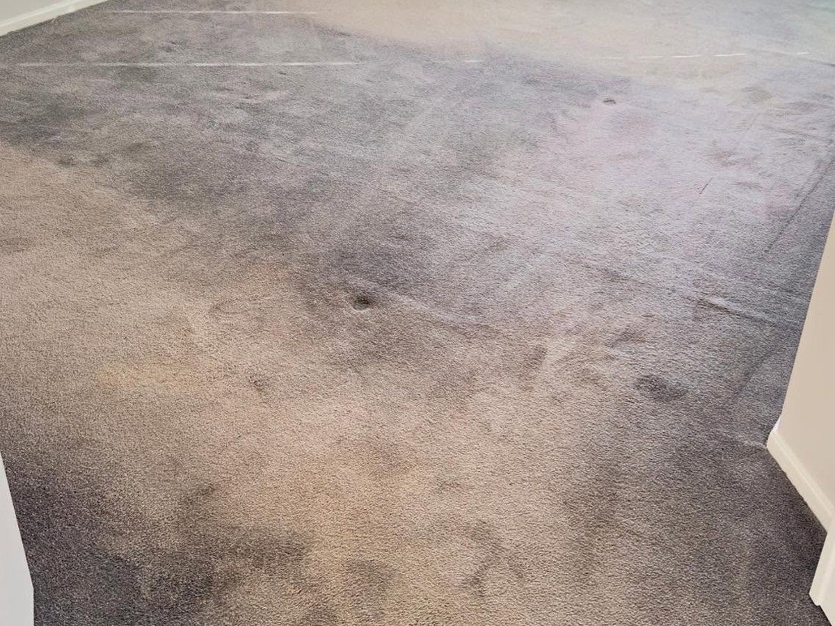 Carpet before professional MyKleaner carpet cleaning, showing heavy dirt and staining
