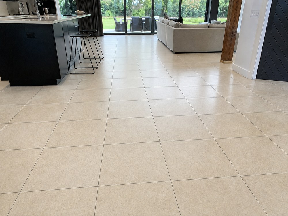 Same tiled floor after professional MyKleaner tile and grout cleaning, clean and restored