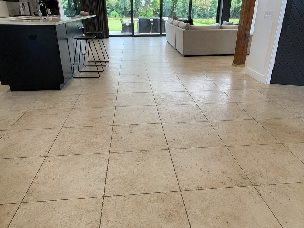 Tiled floor before professional MyKleaner tile and grout cleaning